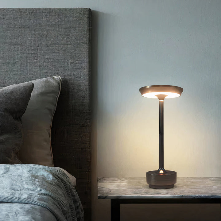 Wireless dimmable designer table lamp in an elegant design