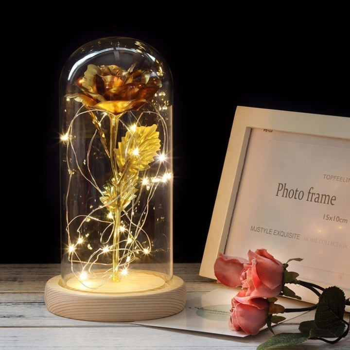 Glass bell with eternal rose and LED lights