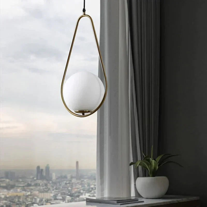 LED pendant light Nordic – glass sphere, gold-colored &amp; modern