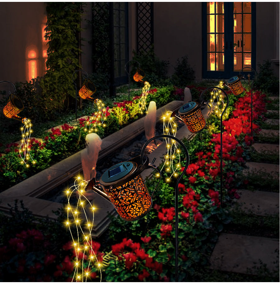 Solar-powered watering can light with LED light cascade for the garden