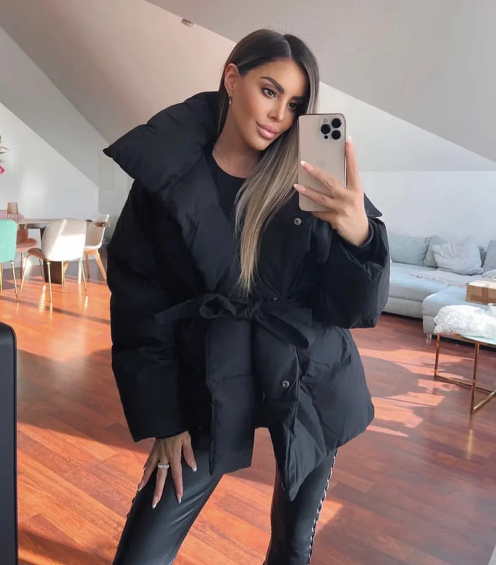 Women's quilted jacket with belt and stand-up collar 