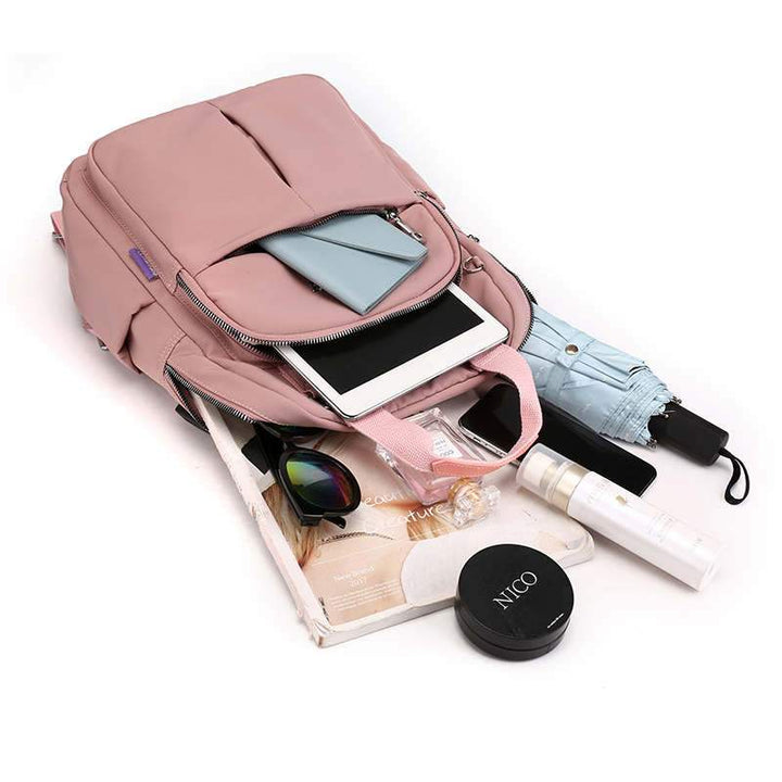Water-repellent USB backpack with anti-theft protection and compartment system